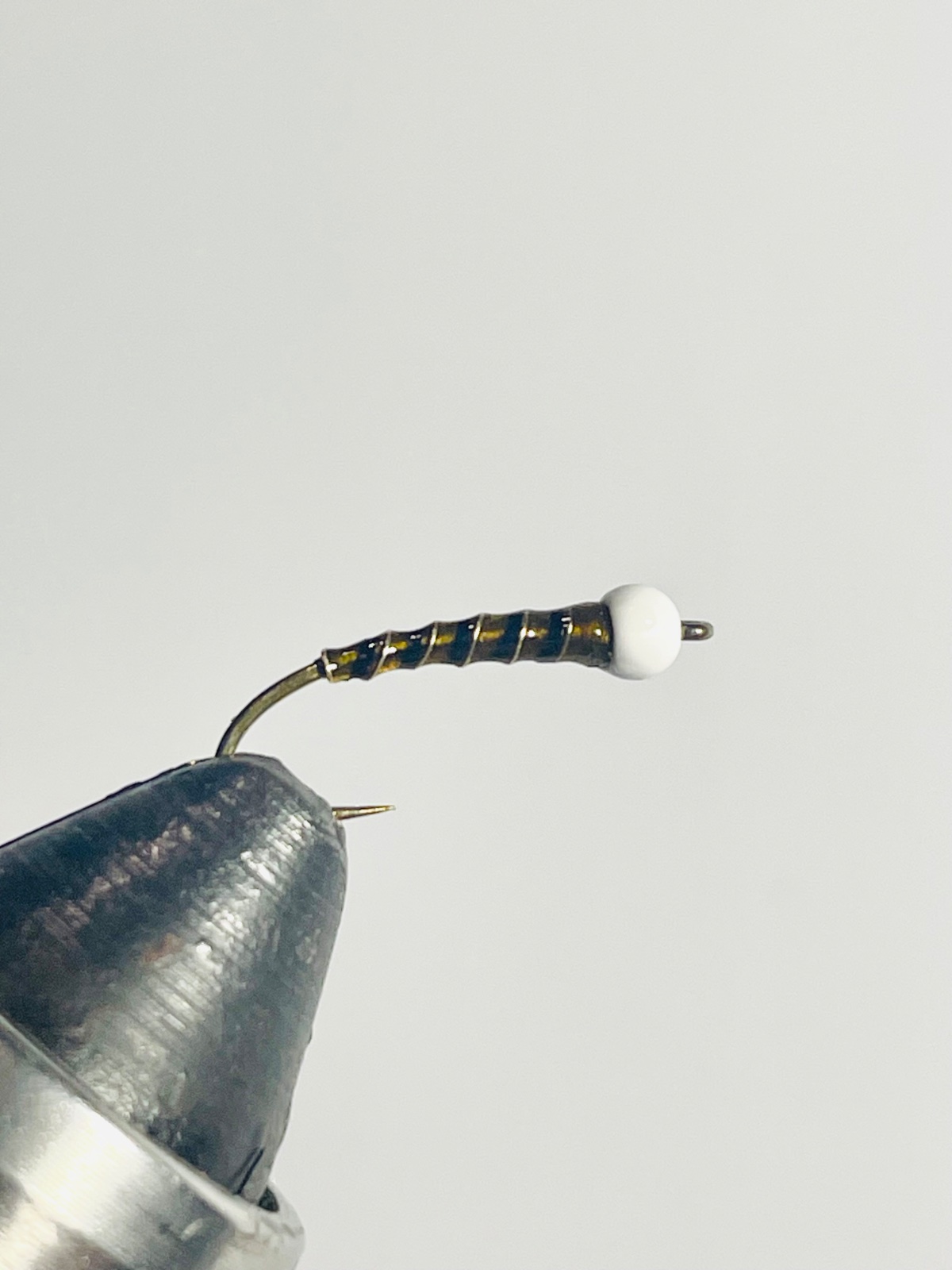 OBG Snow Cone ( Olive, Black, Gold ) fly pattern tied by Brent Jones